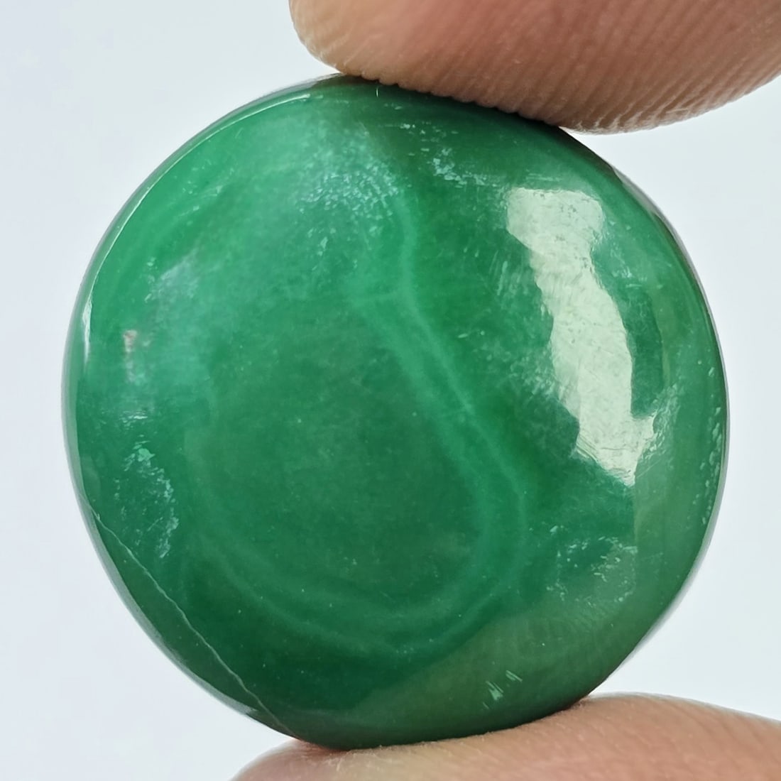 22.31 Ct Natural Malachite: Title:22.31 Ct Natural Malachite Description:Gemstones: Natural Malachite / Carat Weights: 22.31 ct / Size or Dimensions: 18 X 17.30 X 6.40 mm / Treatment: N0 Materials &Techniques:Malachite Reserve:
