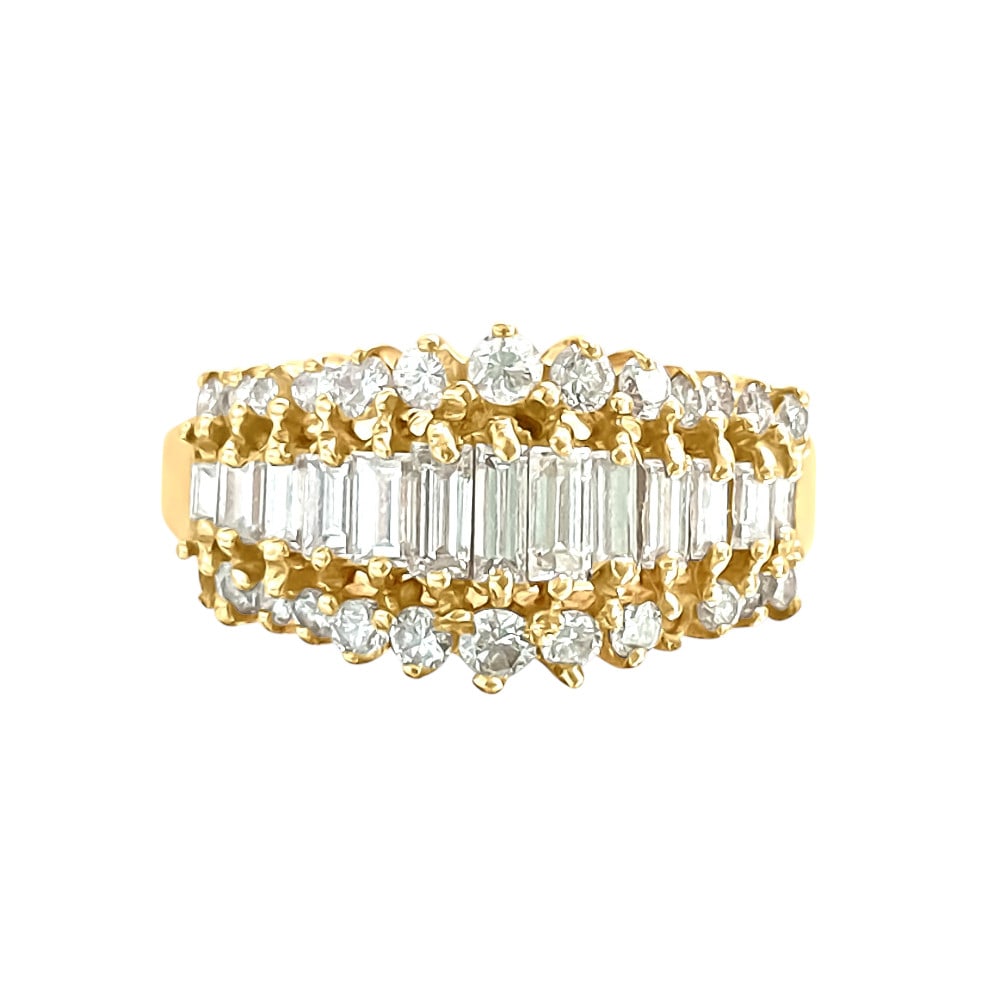1.00 Carat Diamond and Yellow Gold Engagement Ring: Title: 1.00 Carat Diamond and Yellow Gold Engagement Ring Description: Metal: 14K yellow gold. Total carat weight of the diamonds: 1.00 carats. Round brilliant and baguette cut diamonds set in prongs.