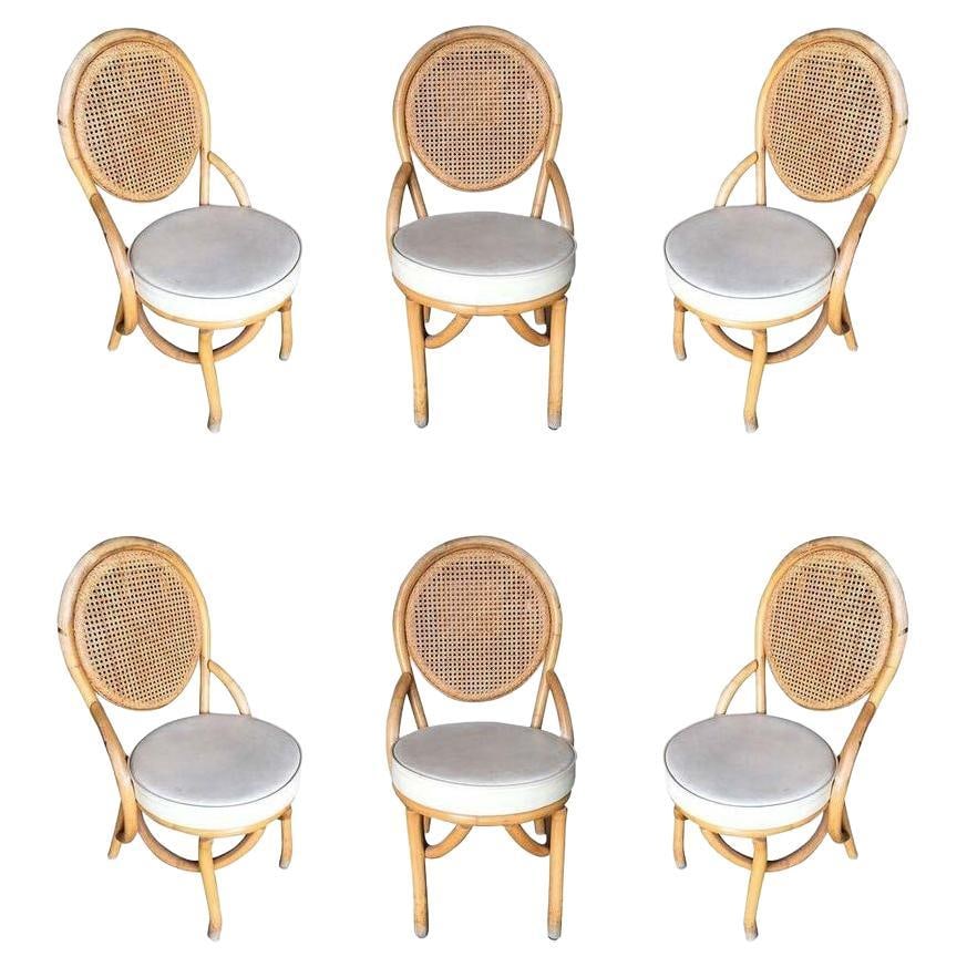 Restored Rattan Dining Side Chair w/ Round Wicker Seat, Set of Six: Title: Restored Rattan Dining Side Chair w/ Round Wicker Seat, Set of Six Description: Set of Six Post-war 1950s rattan dining side chairs with woven wicker seat back and white vinyl seat. We only pur