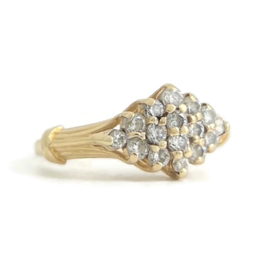 Estate Diamond Cluster Ring 14K Yellow Gold, 2.53 Grams: Estate Diamond Cluster Ring 14K Yellow Gold, 2.53 Grams This is a lovey ring. Please let us know if you have any questions. Diamonds: 16 round brilliant cuts, .41 ctw, F-G, SI1 Metal: 14K yellow gold