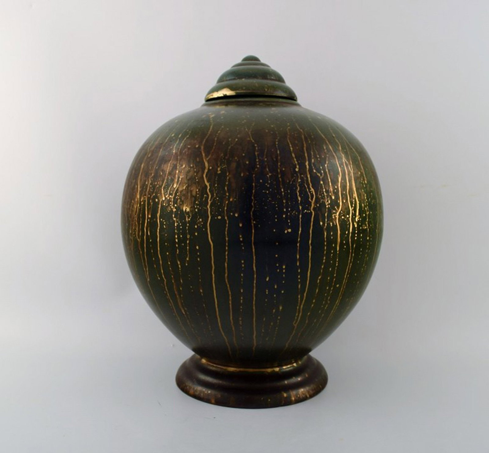 Lucien BRISDOUX (1878-1963) France. Art Deco pottery lidded vase. Unique work.: Lucien BRISDOUX (1878-1963) France. Art Deco pottery lidded vase. Unique work. Beautiful greenish glaze with gold decoration. Stamped. In perfect condition. Measures: 31 cm. x 22 cm. Reserve: $560.00