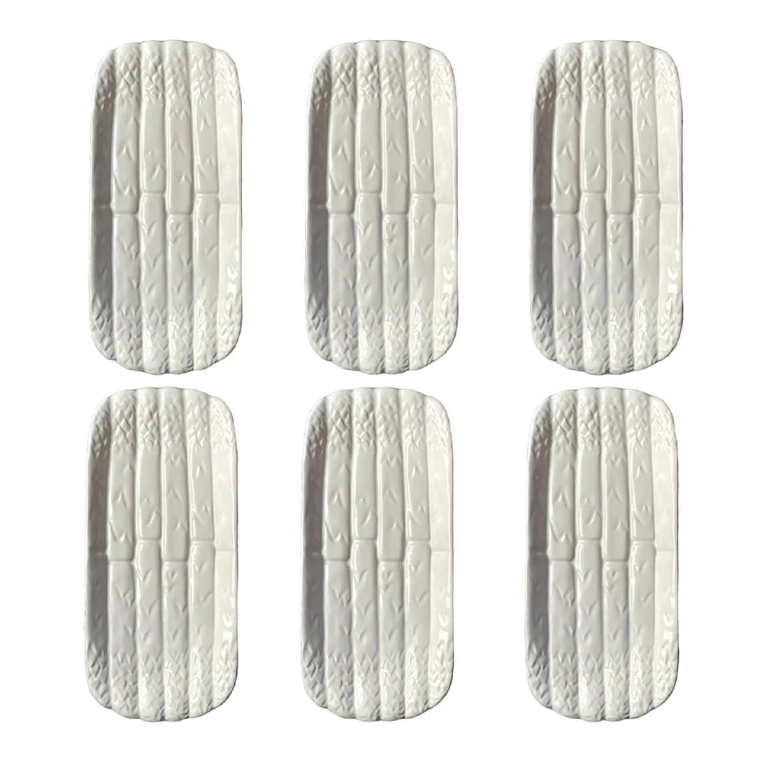1990s White Bordallo Pinheiro Asparagus Dishes- Set of 6: Set of Six, Vintage Bordallo Pinheiro asparagus imprinted white dishes. Measuring 9"x4", these have lots of uses and are no longer made by Bordallo Pinheiro. Condition: Alterations: Original Condition