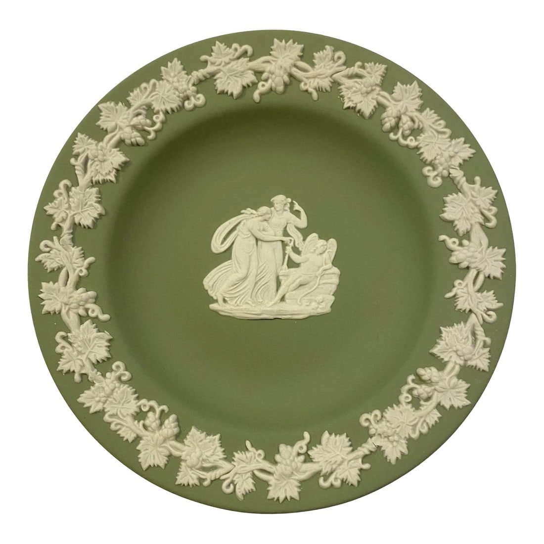 Vintage 1970 Wedgwood Cream on Celadon Jasperware Round Catch-All Tray - Cupid Asleep: Add a touch of English sophistication to your home with this vintage Wedgwood cream on celadon Jasperware small catch-all tray. Celadon background is highlighted with cream-colored laurel leaves on th