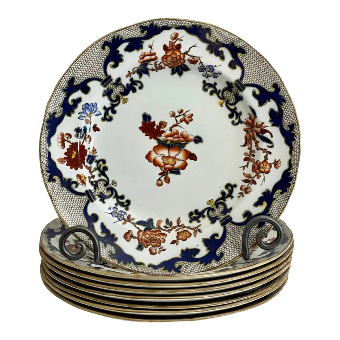 Set of 8 Antique Minton Imari Style Dinner Plates, 1910: Rare set of eight Minton Imari style dinner plates, England, circa 1910. A beautiful antique set saturated with vibrant Imari colors of cobalt blue, earthy red and hand-painted gold accents with a gil
