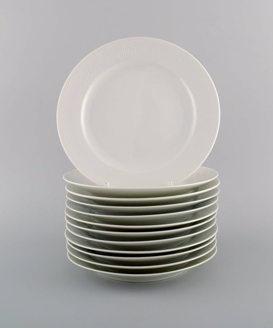 Royal Copenhagen. Salto Service, White. Twelve lunch plates. 1960s.: Royal Copenhagen. Salto Service, White. Twelve lunch plates. 1960s. Diameter: 21.2 cm. In excellent condition. 1st factory quality. Designed by Axel Salto in 1956. Reserve: $588.00 Shipping: Domestic: