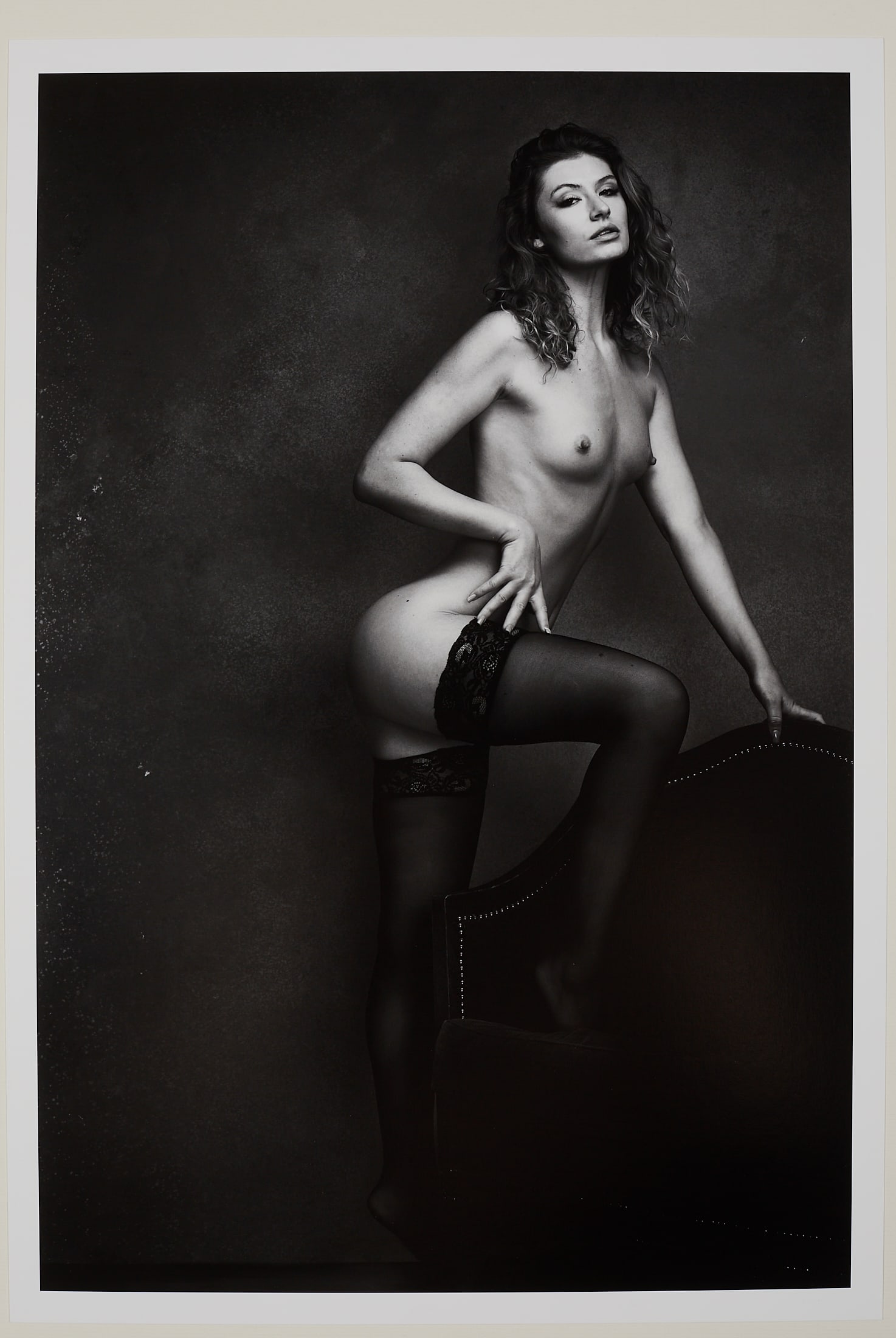 Spiros Politis(1969-): Artist: Spiros Politis(1969-) Title:Chloe P Figure Study w Sofa Date/Period:2025 Materials:photography Size:19" x13" Description:Chloe shot in London studio 2024. Printed on heavy Canson Baryta Presti