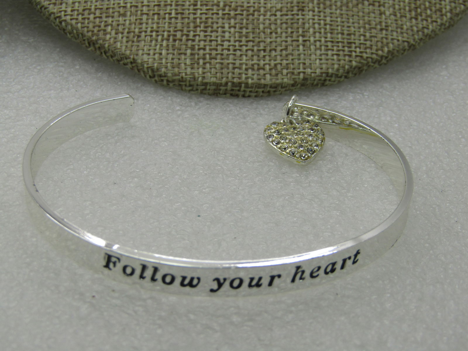 Avon Follow Your Heart Your Heart Cuff Bracelet, 7.25", New in Box: Avon Follow Your Heart Your Heart Cuff Bracelet, 7.25", Dangle pave-set heart charm on the end at opening, Product title is My Truth Charm Bracelet Heart, New in Box. Came from a seller who retired. P