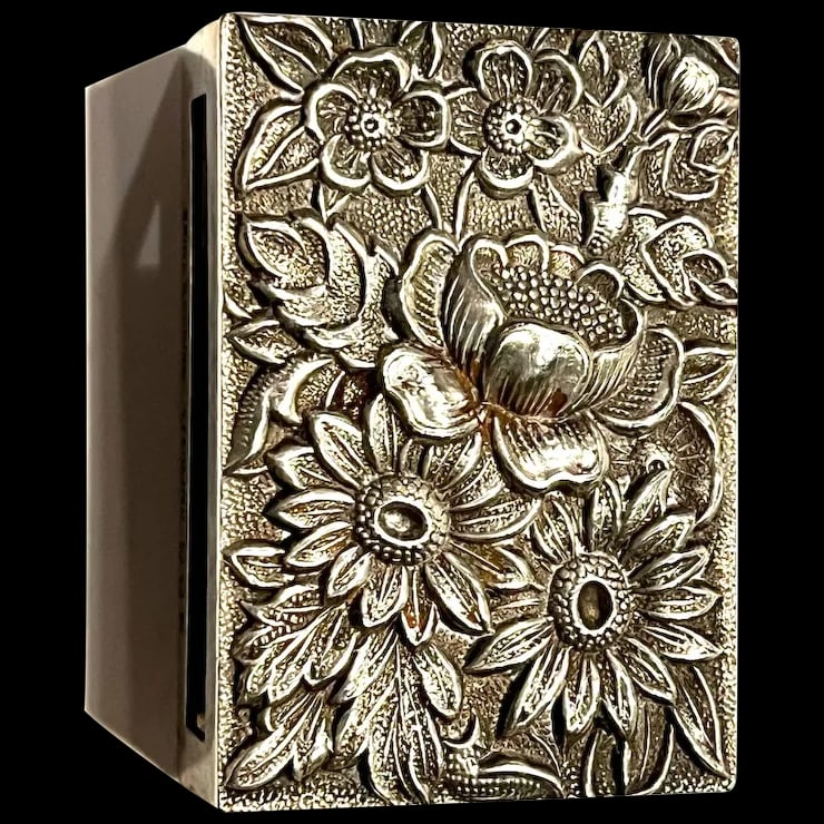 Vintage S. Kirk & Sons Sterling Silver Matchbox Holder with Repousse Floral Design: Vintage S. Kirk & Sons Sterling Silver Matchbox Holder with Repousse Floral Design Hallmarked: S. Kirk & Sons Sterling 90E Weighs 23 grams Measures Approx. 2.75 x 1.25 Reserve: $45.00 Shipping: Domest