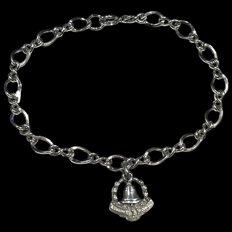 Vintage Sterling Silver Charm Bracelet Attendance 1 Year Award Charm: Vintage Sterling Silver Charm Bracelet Attendance 1 Year Award Charm Bracelet Hallmarked: Sterling, Charm Hallmarked: CTO Sterling Weighs 7.6 grams Measures 7 inches length Reserve: $35.00 Shipping: D