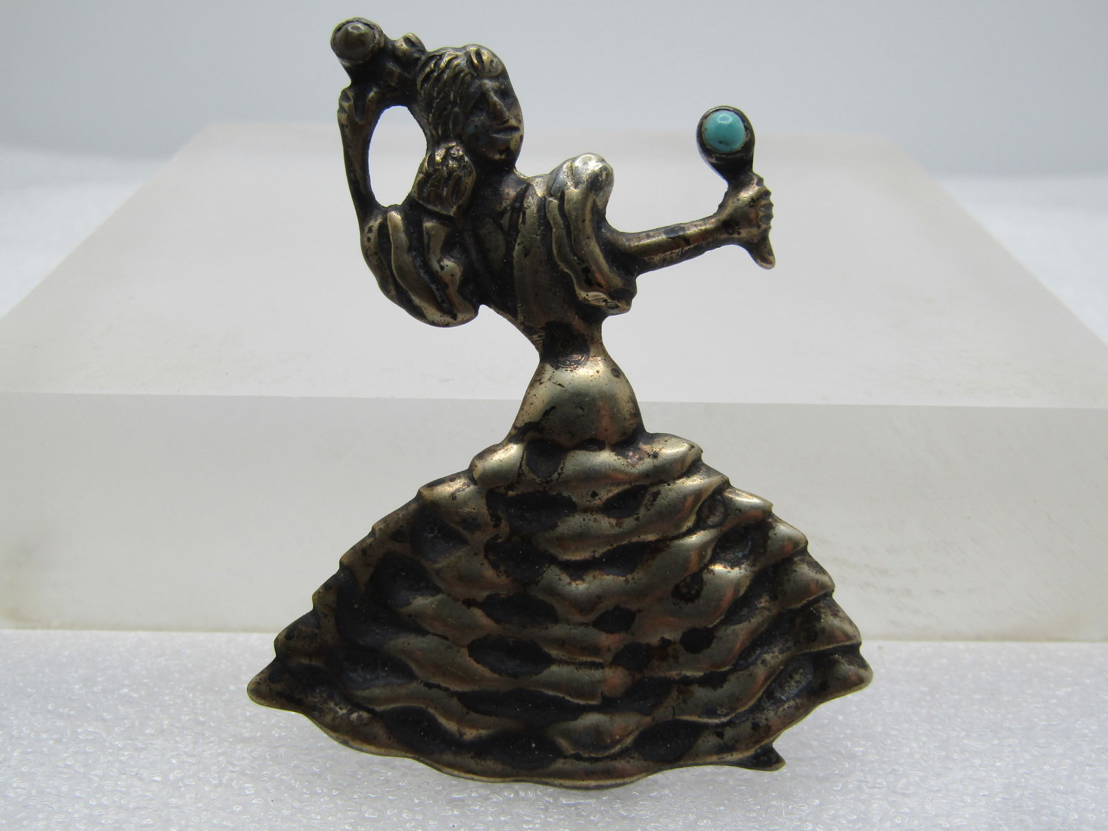 Vintage Sterling Flamenco Dancer Brooch, Turquoise, Mexico, Mid-Century: Vintage Sterling Flamenco Dancer Brooch, Turquoise, Mexico, Mid-Century. This is appx. 2.25" tall and 2" wide with two maracas - one with a green stone - perhaps onyx and the other a turquoise. It is