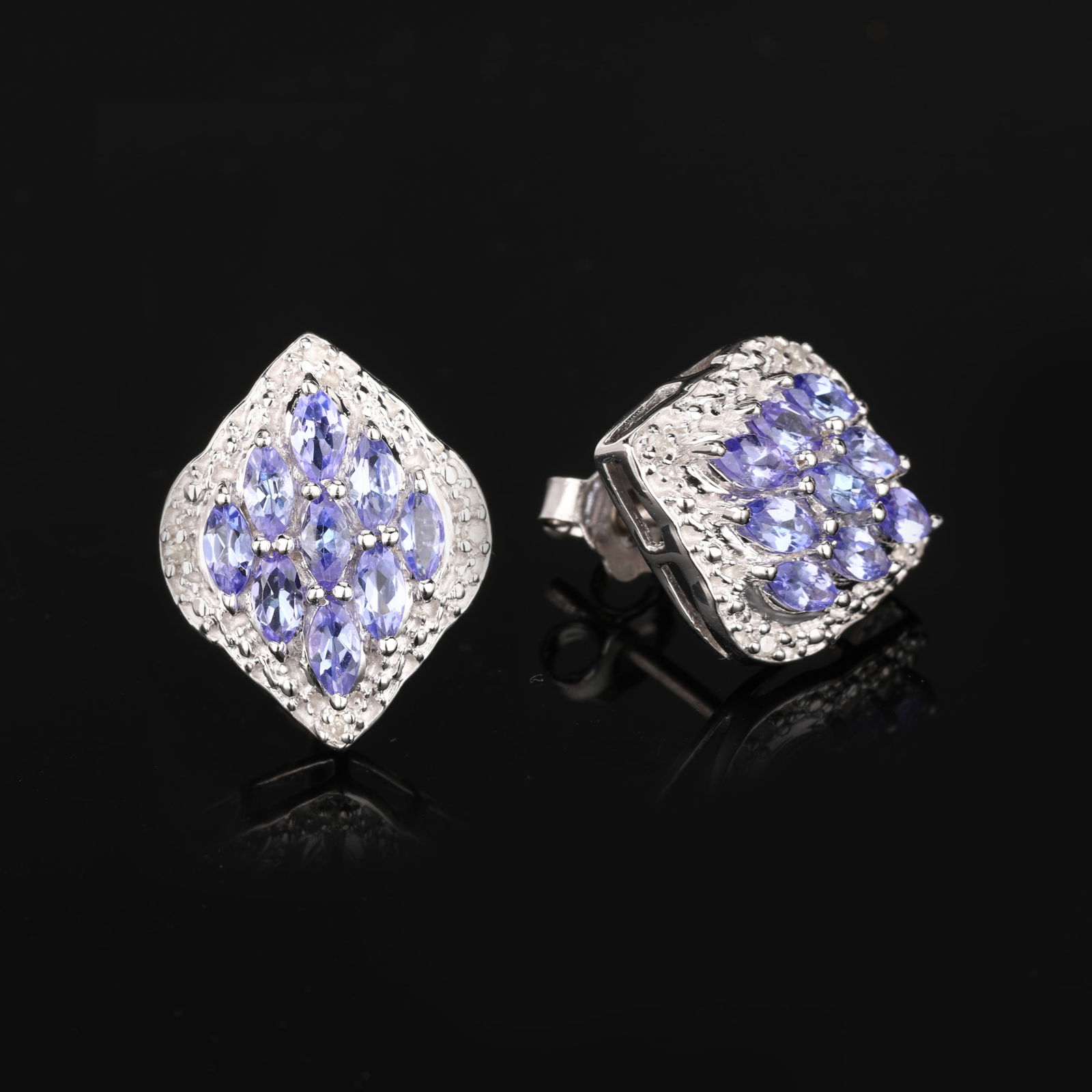 Earrings: Tanzanite ( A -A+ ) Marquise 4x2mm: Title: Earrings: Tanzanite ( A -A+ ) Marquise 4x2mm Description: Tanzanite ( A -A+ ) Marquise 4x2mm - 18Pcs + White Topaz Round 1.00mm - 8Pcs After 2000 Materials: 925 Silver W/Rhodium Weight: 4.3 Met