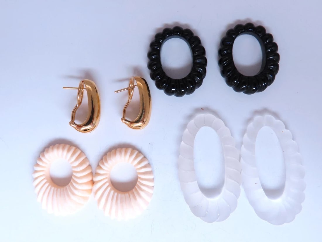 Interchangeable Onyx Moonstone Coral Gold Dangle Earrings 18kt 12632: Title Interchangeable Onyx Moonstone Coral Gold Dangle Earrings 18kt 12632 $1,500.00 PRODUCT DESCRIPTION Interchangeable Earrings 29 x 24mm onyx 42 x 25mm moonstone 29 x 24mm White coral 20 x 18mm ear