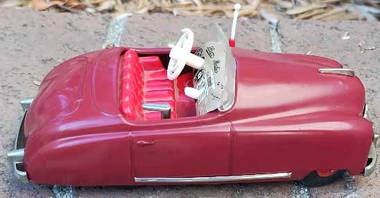 Schuco Radio 4012 (made in US Zone Germany,) two windup motors, one propels the car, the other one: Title: Schuco Radio 4012 (made in US Zone Germany,) two windup motors, one propels the car, the other one propels a music box (the "radio"), rack and pinion steering, functional handbrake, c10 . Descr