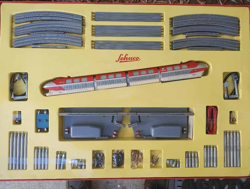 Schuco Disney monorail 6333S , Made in Germany 1959,c10 in c8 box, this is the larger 4 car: Title: Schuco Disney monorail 6333S , Made in Germany 1959,c10 in c8 box, this is the larger 4 car monorail, with more pilons and track segments , two automatic switches and two semaphores, complete.