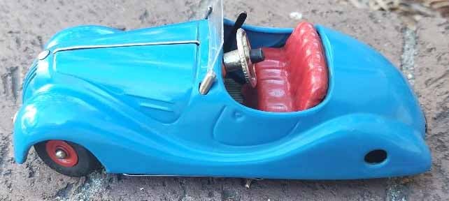 Schuco Akustico 2002 (Made in US Zone Germany), BMW 328 car, windup motor , rack and pinion: Title: Schuco Akustico 2002 (Made in US Zone Germany), BMW 328 car, windup motor , rack and pinion steering, working horn, c10. Description: Schuco Akustico 2002 (Made in US Zone Germany), BMW 328 car