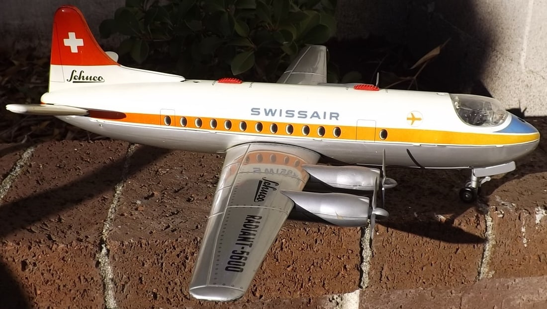 Schuco Radiant 5600 SwissAir , the very much sought after Vickers Viscount plane type, with complex: Title: Schuco Radiant 5600 SwissAir , the very much sought after Vickers Viscount plane type, with complex sequencing of props and taxiing, c9 , remote wire steering, in c8 box, Engines rev up one by