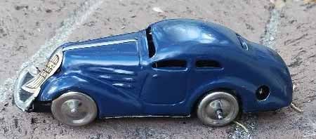 Schuco "Patent 1010" (made in Germany only 3 years, between 1938 and 1941), c8, the car has a clever: Title: Schuco "Patent 1010" (made in Germany only 3 years, between 1938 and 1941), c8, the car has a clever transverse wheel that makes it turn when it reaches the edge of the table. Description: Schu