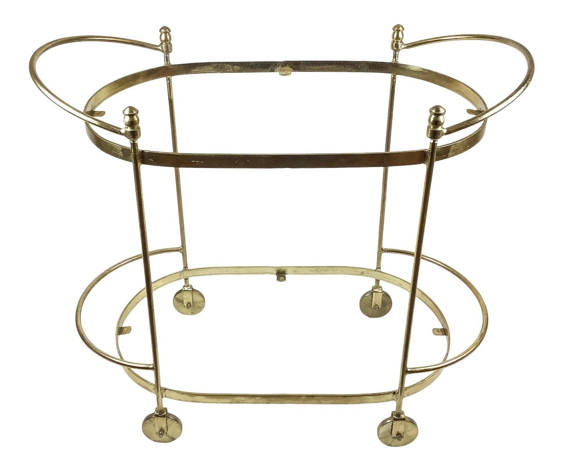 Gold Tone Hollywood Barcart: Golden metal 2 level rolling bar cart with new clear acrylic shelves never used. These shelves still have the paper protection on them in order to prevent scratches. A sexy bar cart to show off your c