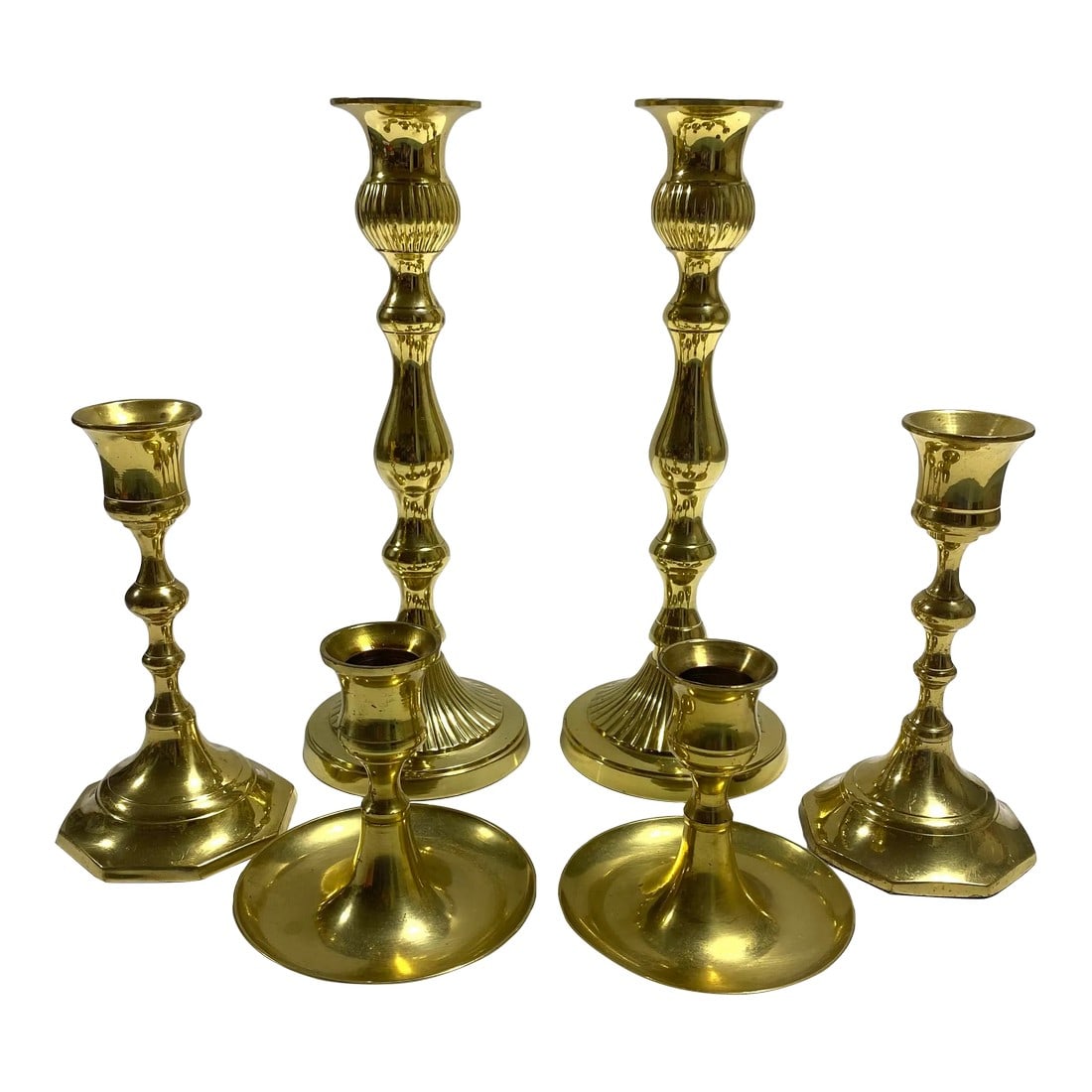 1980s Brass Candlesticks- Set of 6: These is a beautiful set of high-quality brass candlesticks. The two larger set have some weight to them. I put them together in this lot because the finish and patina is similar and I like the height
