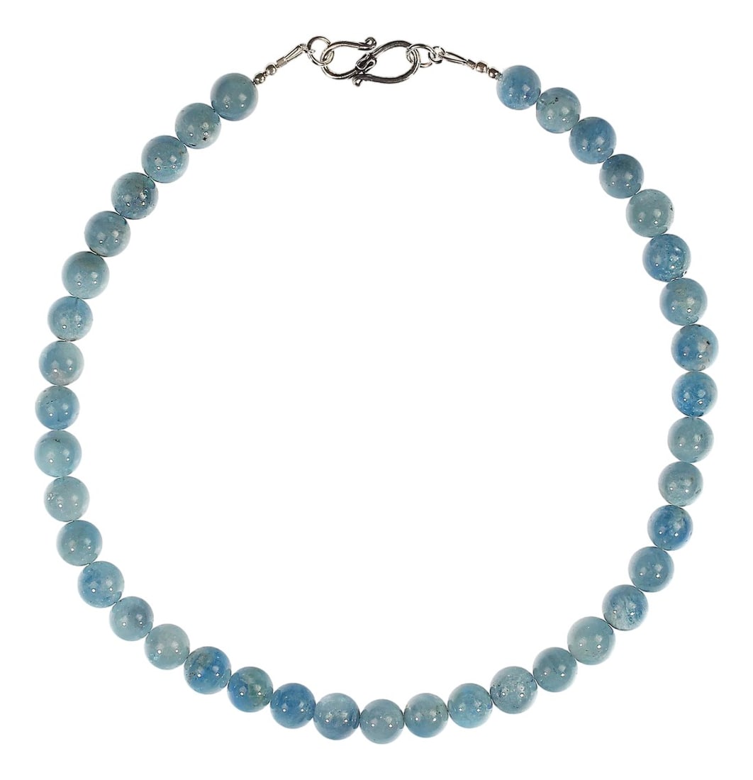 Ajd 17 Inch Translucent Medium/Dark Blue Aquamarine Necklace: This exquisite 17-inch aquamarine necklace showcases a graceful arrangement of smooth, round 10mm beads in captivating shades of medium to dark blue. Each bead is highly polished to reveal the stone's