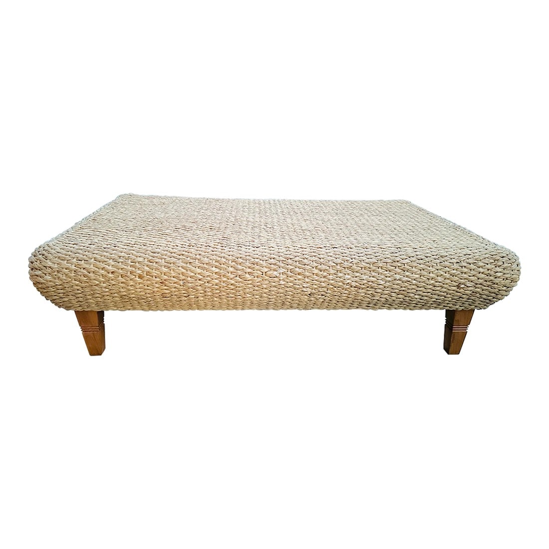 Handwoven Seagrass Rectangle Coffee Table/Ottoman: Handwoven Seagrass Rectangle Coffee Table with wooden legs. Great for a covered patio or sun room. Would be great with a piece of glass on top to protect. Wood construction 15.5in h x 36.5in d x 58in 