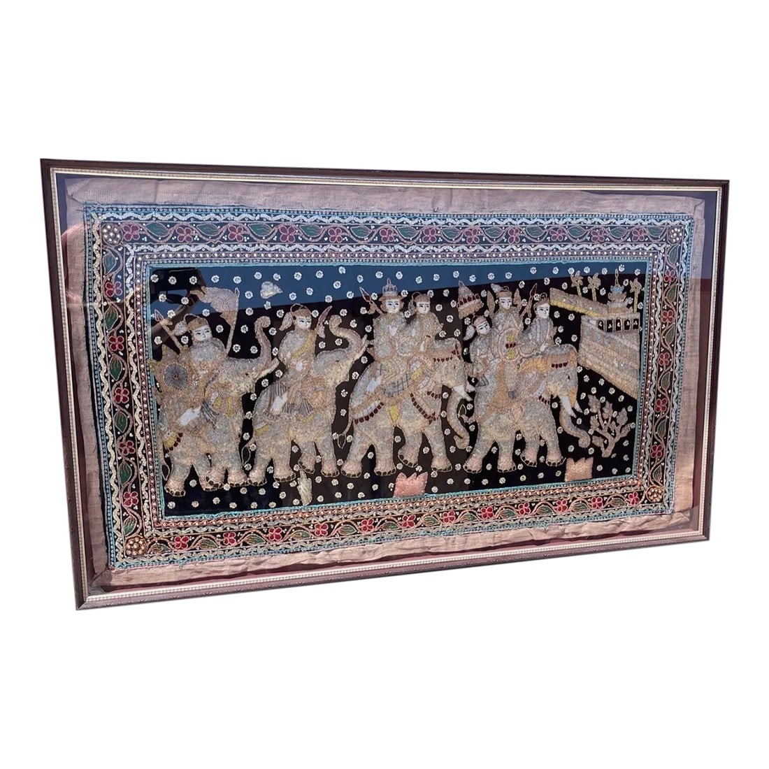 Large Antique Burmese Kalaga Tapestry Framed Wall Art: Large Antique Burmese Kalaga Framed Tapestry in a framed plexiglass shadow box. Elephants and riders in parade at center with raised batting, sequins, glass beads and metallic woven cotton threads on