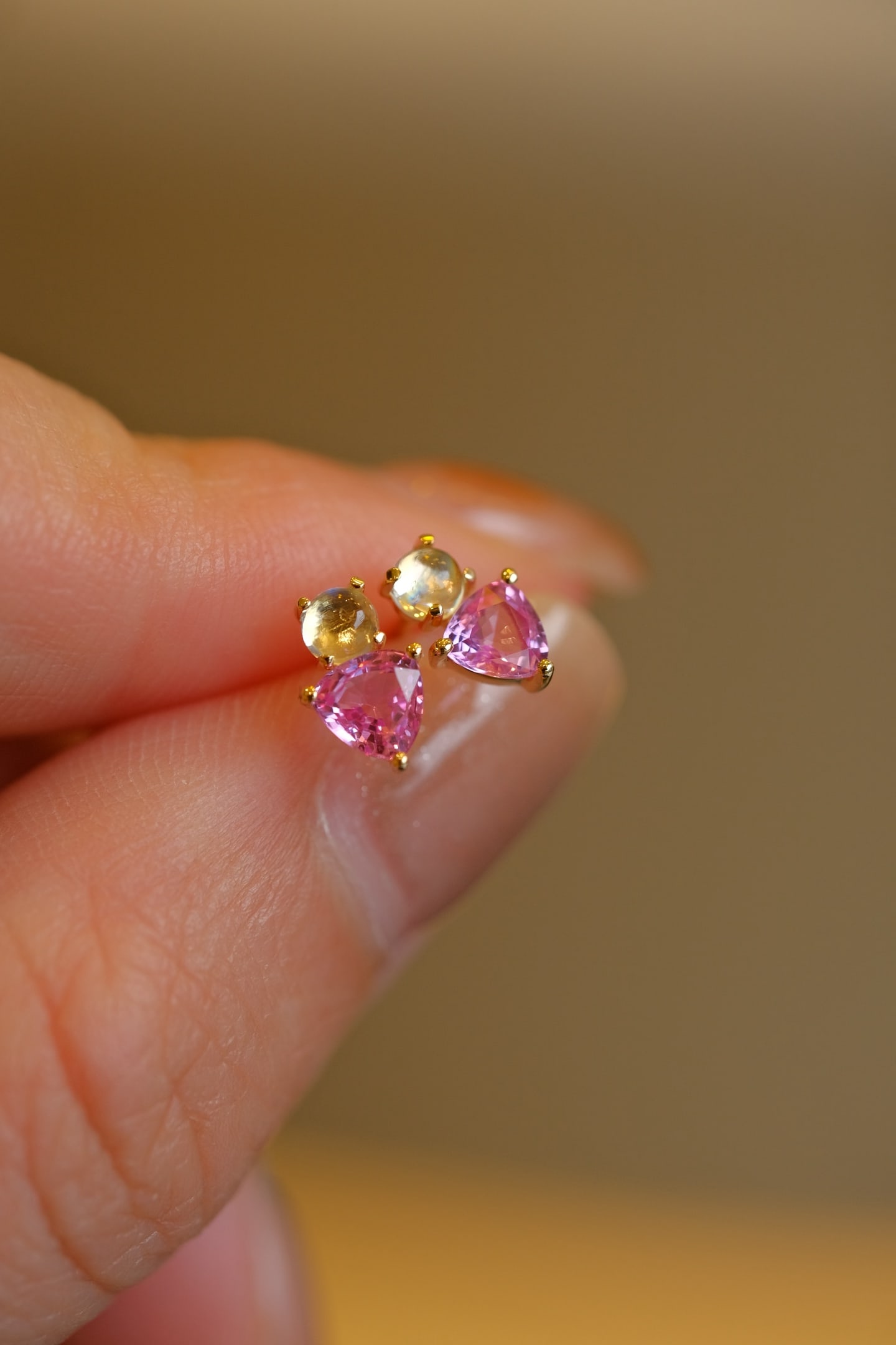 18K Pink and Blue Sapphire Stud Earrings: 18K Pink Sapphire Earrings - Natural pink sapphire paired with moonstone, sweet and elegant when worn Reserve: $500.00 Shipping: Domestic: Shipping rates are determined by destination International: F