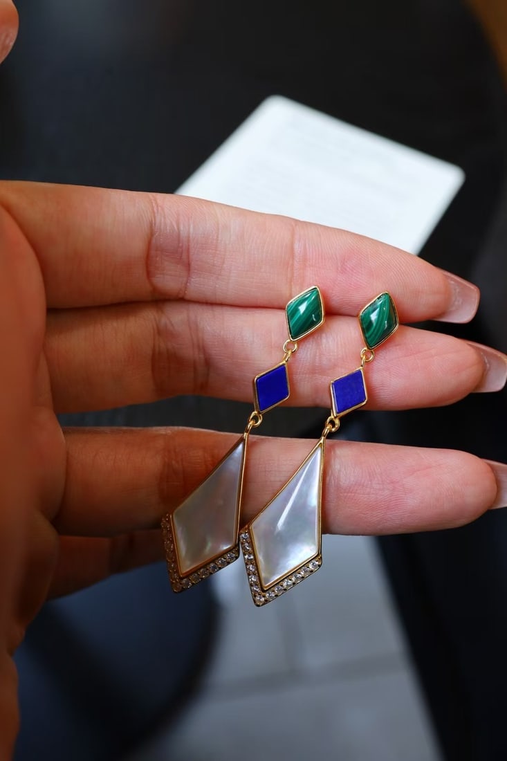 Natural Malachite Lapis Lazuli White Mother-of-Pearl Earrings: Natural Malachite Lapis Lazuli White Mother-of-Pearl Earrings. Geometric Design. Reserve: $200.00 Shipping: Domestic: Shipping rates are determined by destination International: Foreign shipping rates