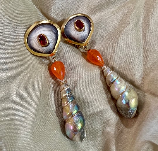 Carnelian, Sapphire and Fossil Shell Earrings: Title:Carnelian, Sapphire and Fossil Shell Earrings Description:Love the combination of theCarnelian and deep Pink Sapphires in these ancient fossil Earrings - 2" drop from post - Vermeil Reserve: $61