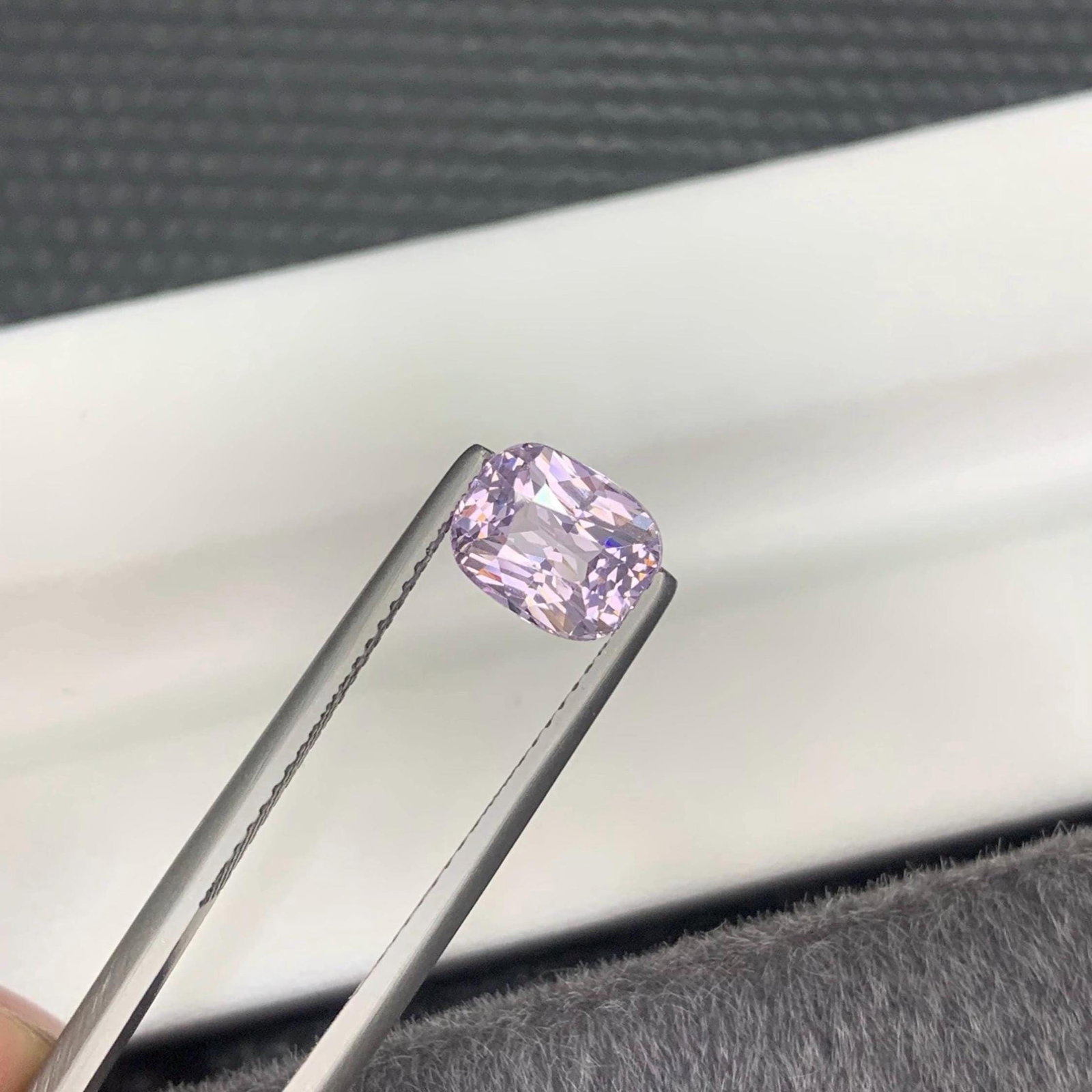 GIA Certified Light Purple Spinel Gem: 2.06 Carat Cushion Cut: This exquisite 5.65 carat rhodolite garnet is a rare find, sourced from the highly regarded Kalalani Tanga mine in Tanzania, a locality celebrated for producing exceptional and uniquely colored gemsto