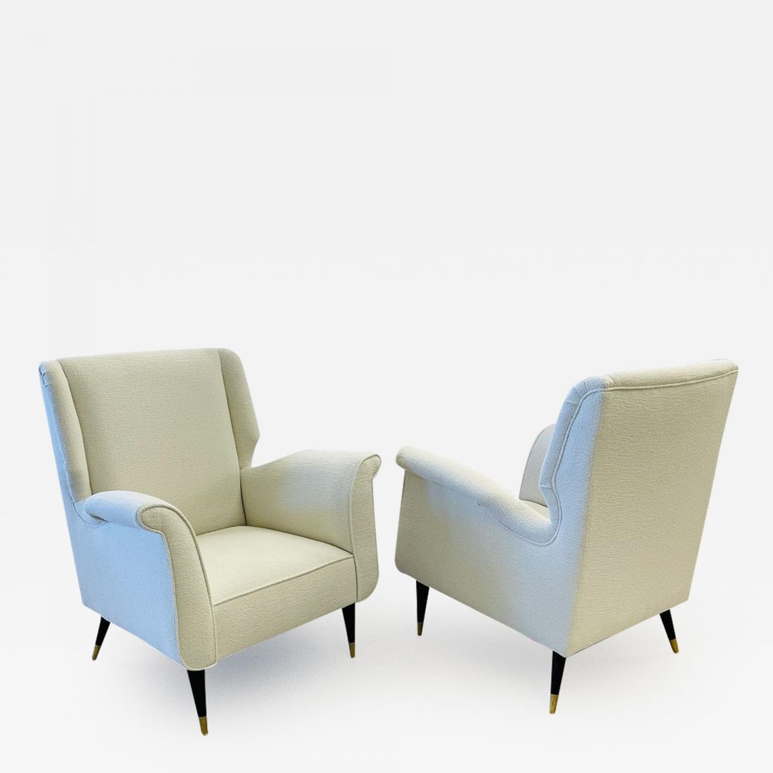 Mid-Century Modern Gio Ponti Style Armchairs, Wingback Chairs, Pair in Bouclé: Mid-Century Modern Gio Ponti Style Armchairs, Wingback Chairs, Pair in Kravet Bouclé These finely detailed sleek and stylish armchairs depict this iconic designer’s style for flair and simp