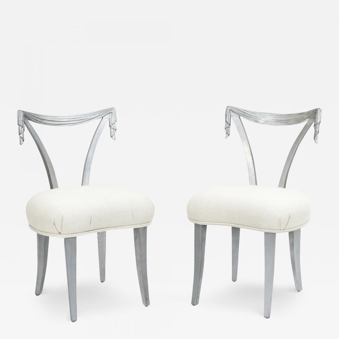 Pair of Dorothy Draper Grosfeld House Side Chairs, Mid-Century Modern: Pair of silver painted Grosfeld House draper chairs. Each in a nice covered finish with drapery form designed back rests. Mid-Century Modern having a cream woven upholstery. hEH. Reserve: $2,975.00 S