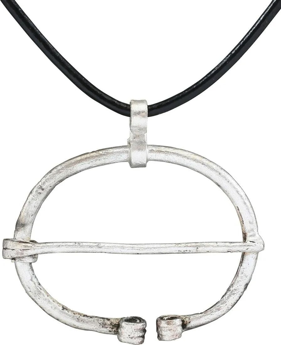 RARE VIKING PROTECTIVE BROOCH NECKLACE, 9th CENTURY: Worn in numbers on the surface of the jerkin, these small metal brooches provided a measure of protection against sword cuts and, in fact, were a form of armor. See current Public Television programmi