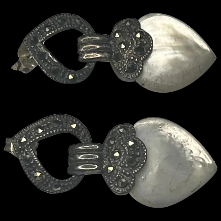 Vintage Sterling Silver Marcasite and Moonstone Heart Earrings: Title: Vintage Sterling Silver Marcasite and Moonstone Heart Earrings Description: Vintage Sterling Silver Marcasite and Moonstone Heart EarringsSterling SilverWeighs 8.5 gramsMeasures .05 x 1.25 inch
