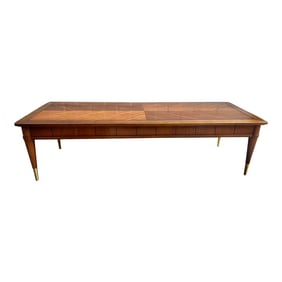 Vintage Mid-Century Modern Book Matched Walnut Coffee /Cocktail Table With Tapered Legs and Brass Fe