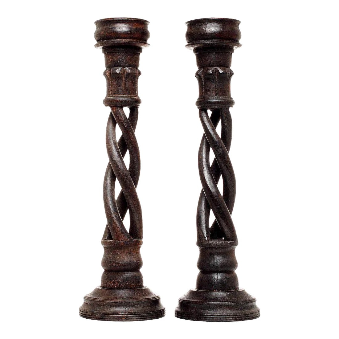 Vintage Indian Wooden Candlesticks With Spiral Design, 20th Century - a Pair: A vintage pair of wooden candlesticks with spiral design carved in India in the late 20th century. These tall candlesticks display a large carved circular base surmounted by an openwork spiral showcas
