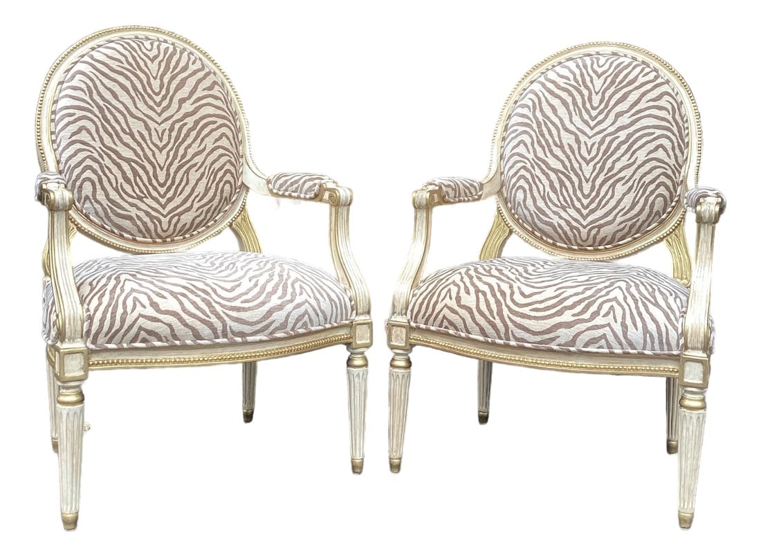 Pair of Michael Taylor "Diana" Armchairs in Hinson by Scalamandre Upholstery: A stunning restored pair of carved and giltwood armchairs by Michael Taylor. These elegant Louis XVI–style chairs feature fluted legs, contoured arms, and generous proportions that reflect Taylo