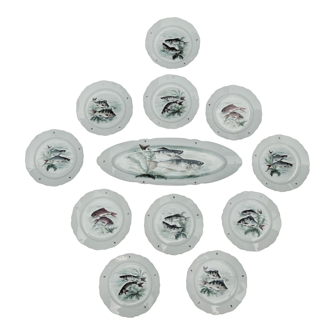 Limoges Fish Motif Dinnerware Set of 11 Plates Plus Oval Platter by Porceleaines De Couleuvre: Detailed set of 11 porcelain 10" diameter (1.5" H) fish motif plates plus a matchihg oval platter (22.75" L x 8" D x 2" H) from Porcelaines de Couleuvre, France.. Scalloped edges have hand-gilded rims