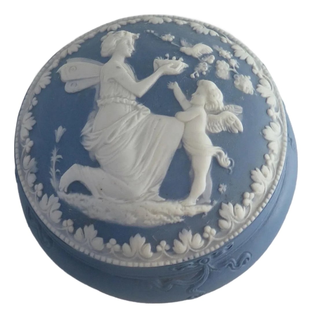 Early 20th Century Jasperware Vanity Box: This vintage early 1900's Jasperware ladies matte finished blue bisque vanity box is beautifully decorated with a wonderful dimensional untinted white bisque scene. This round sculpted lid cover scene