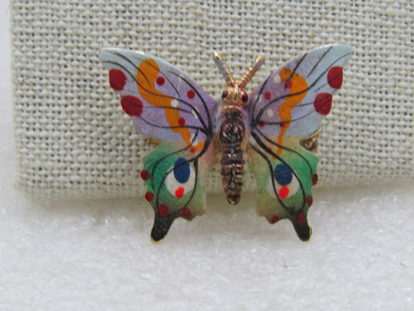 Vintage Enameled Butterfly Brooch, 1.75" by 1", Signed: Title: Vintage Enameled Butterfly Brooch, 1.75" by 1", Signed Description: Vintage Enameled Butterfly Brooch, 1.75" by 1", Signed FORIEGN (like foreign misspelled). The butterfly is in lavender, green