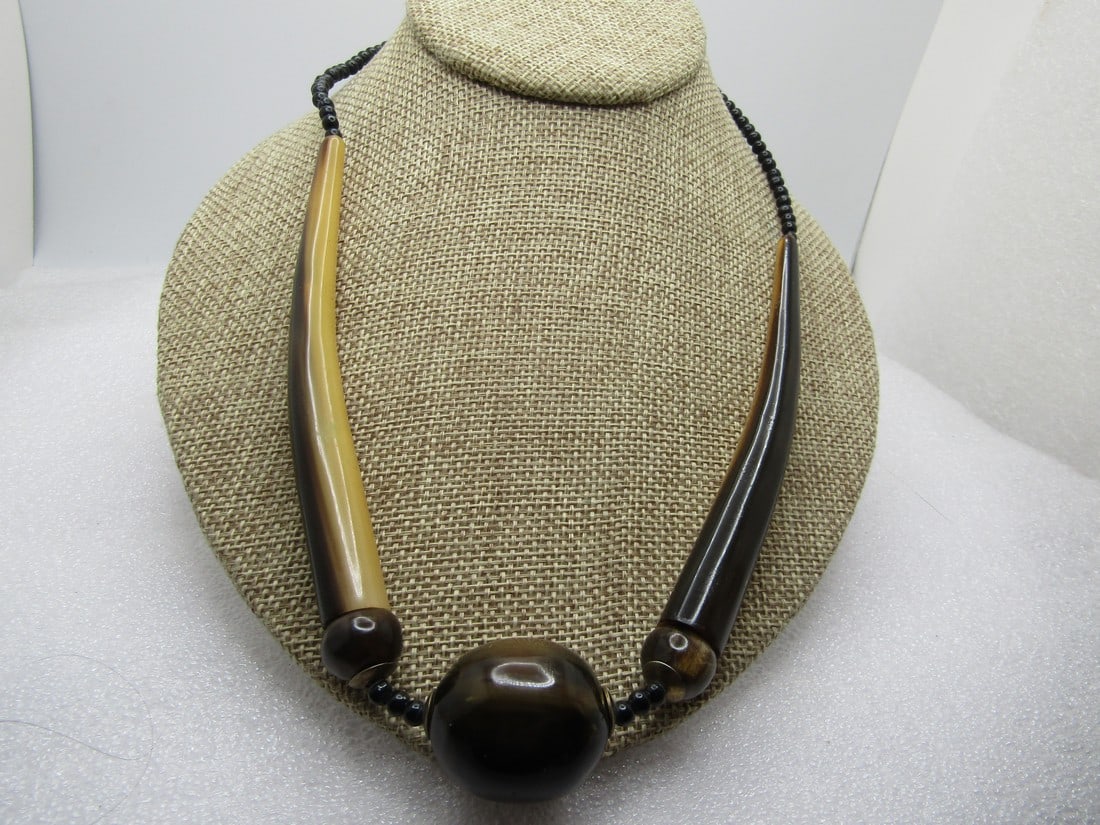 Vintage Tribal Horn Beaded Necklace, 21", 1960's-1970's: Title: Vintage Tribal Horn Beaded Necklace, 21", 1960's-1970's Description: Vintage Tribal Horn Beaded Necklace, 21", 1960's-1970's. Black beads at the back of the neck that are appx. 3.5mm. The long