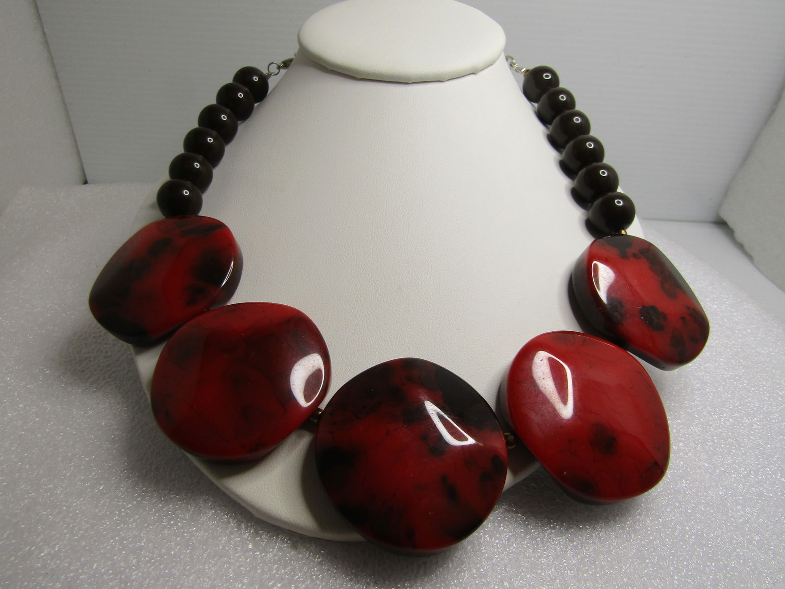 Vintage Heavy Red/Brown/Black Lucite Necklace, Chunky and Bold, 20", 1980's: Title: Vintage Heavy Red/Brown/Black Lucite Necklace, Chunky and Bold, 20", 1980's Description: Vintage Heavy Red/Brown/Black Lucite Necklace, Chunky and Bold, 21", 1980's. This looks like red and bla