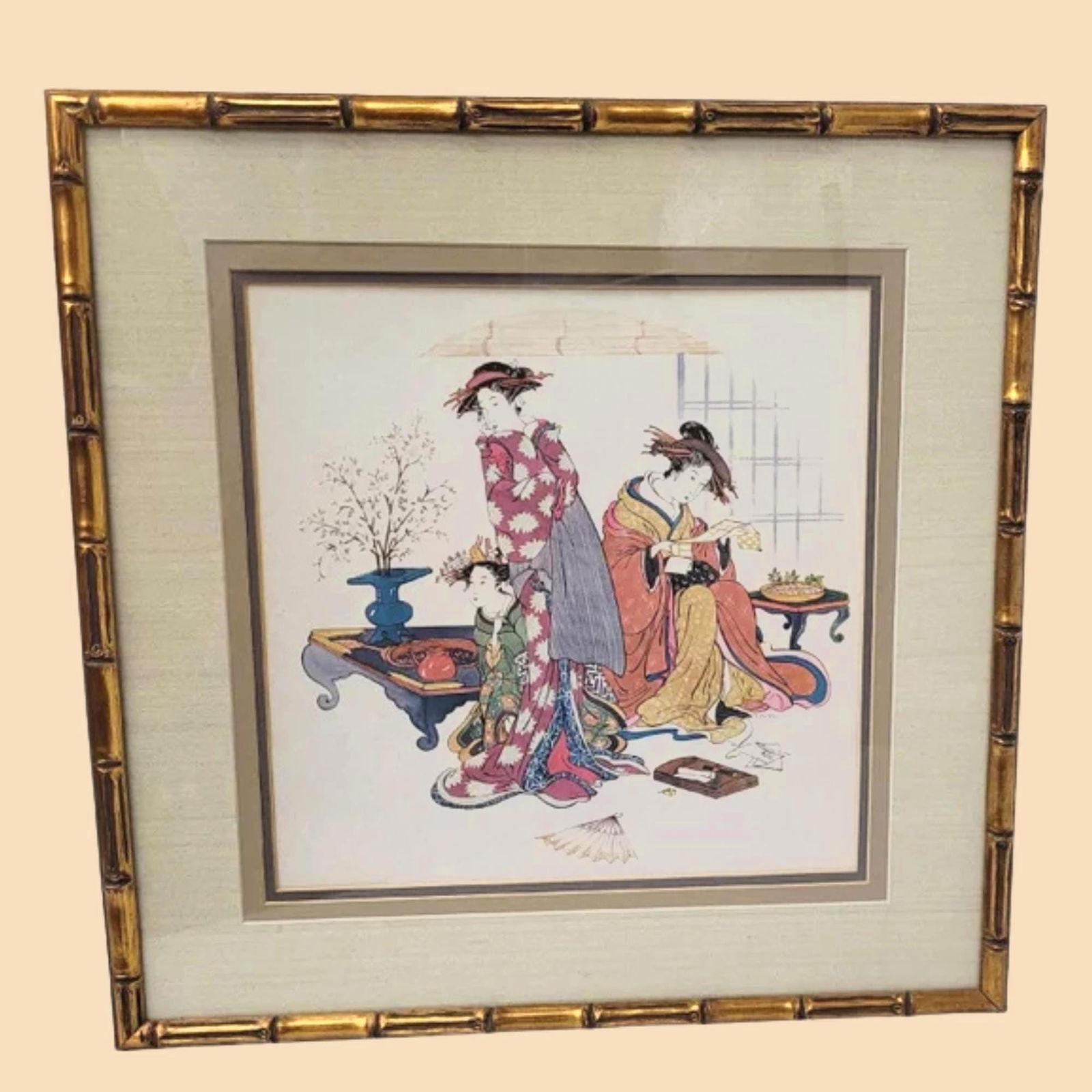 Vintage Asian Print Bamboo Gold Gilt Frame Hollywood Regency Hanging Wall Art Japandi Fun: Vintage from the 1970s Materials: Linen, paper, wood Vintage Watercolor Wall Art Hanging. Featuring a stunning square print framed in a beautiful gold gilt bamboo frame, this piece exudes classic Asia