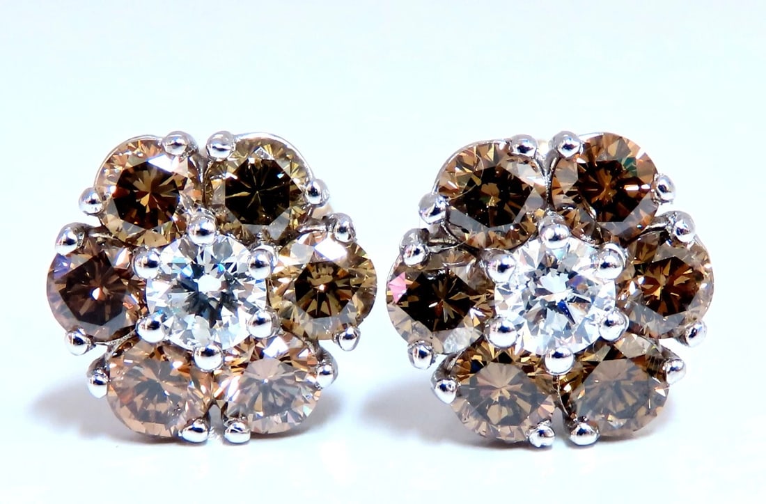 2.44ct. natural round diamond cluster earrings 14 karat Fancy Browns**: Cluster diamond earrings. Natural round diamonds .36ct center (2) diamonds. G-color Vs-2 clarity 2.44ct side diamond accents. Natural Fancy Browns - Si-1 clarity 14 karat white gold 3.5 grams Earrings
