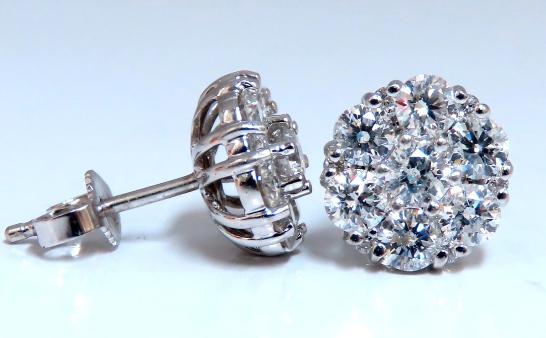 1.50ct. natural round diamond cluster earrings 14 karat**: Cluster diamond earrings. 1.50 carat natural round diamonds G - color vs2 clarity 14 karat white gold 3.2 grams Earrings measure 9.8 mm wide $11,000 appraisal certificate to accompany ....*.
