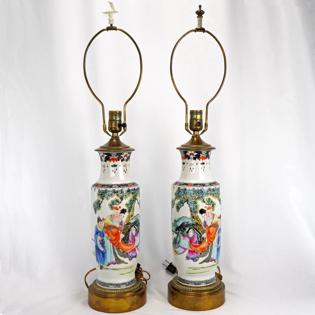 Pair of 1920s Chinese Porcelain Urn Lamps: Title:Pair of 1920s Chinese Porcelain Urn Lamps Size:Overall 30 in (76.2 cm) tall x 6 in (15.2 cm) diameter Base only – 13 ½ in (34.3 cm) tall. Description:An antique mirrored pair of Chinese