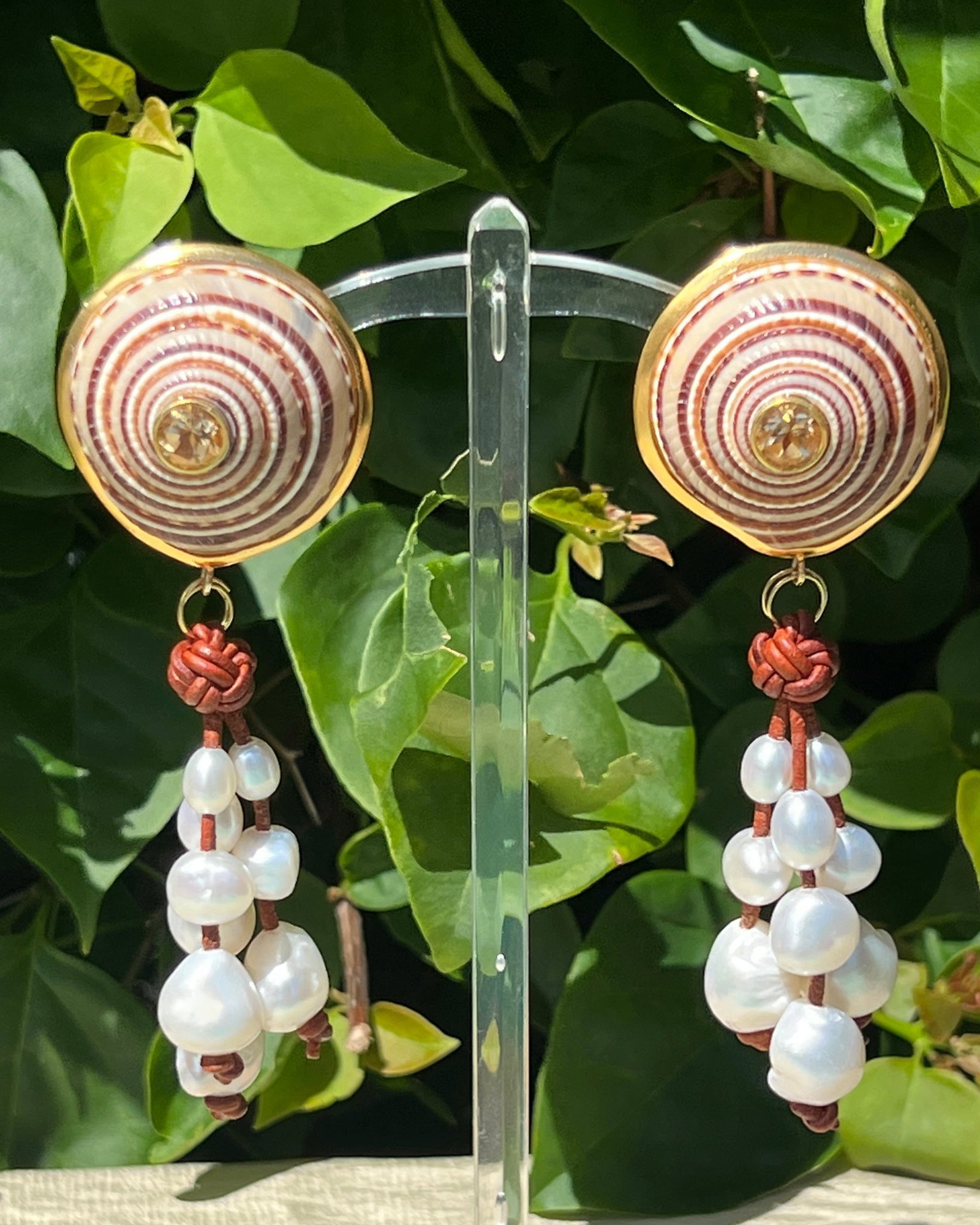 Sundial Shell & Pearl Drop Earrings: Title:Sundial Shell & Pearl Drop Earrings Description:Fun dangles and great button earrings! The pearls on leather are removable! Go from work to dinner by adding the dangle! Sundial Shells set with C