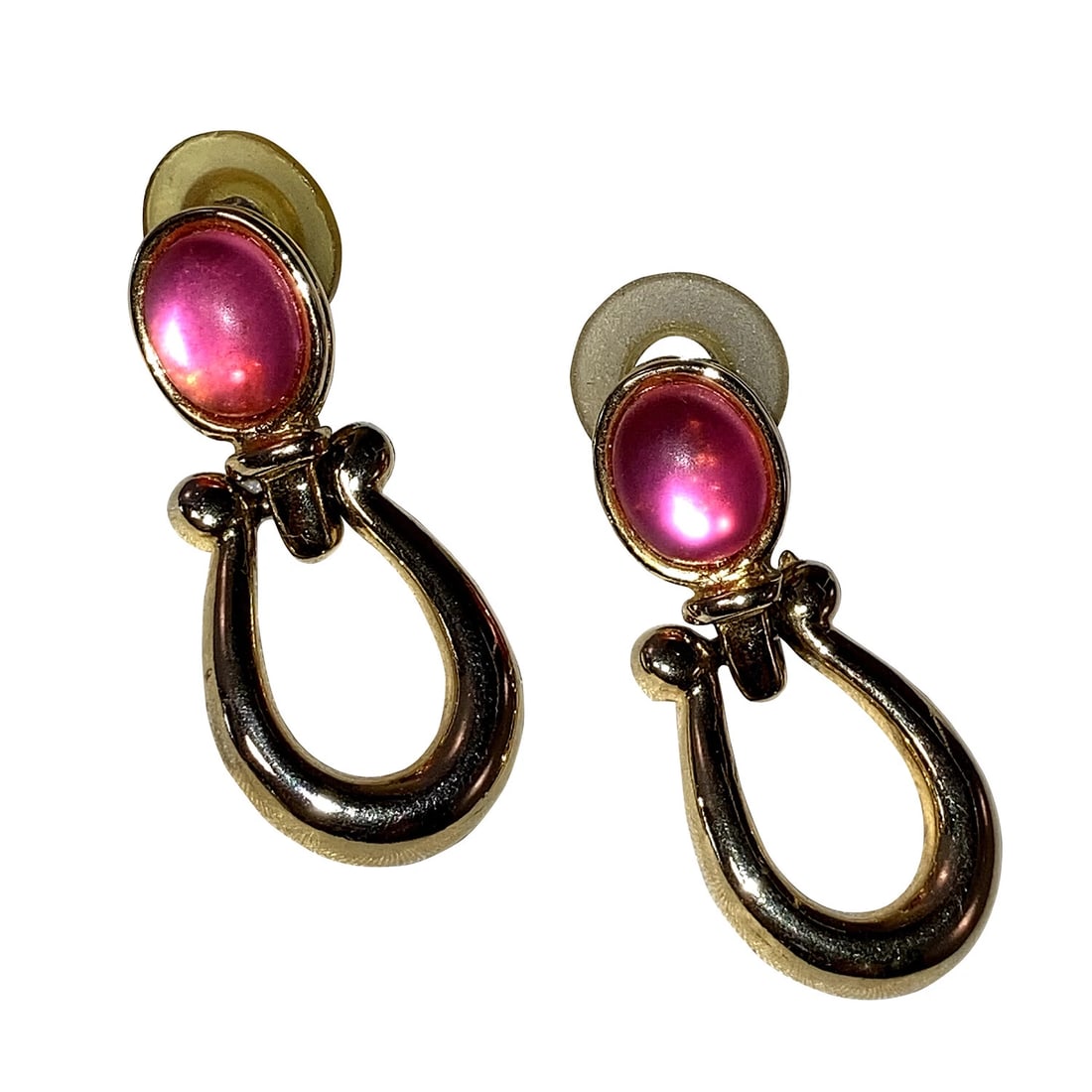 Paolo Gucci Simulated Pink Sapphire Lucite Stirrup Earrings: Title:Paolo Gucci Simulated Pink Sapphire Lucite Stirrup Earrings Description:Paolo Gucci simulated pink sapphire lucite hoop dangle earrings, 18 kt gold plated over costume metal. Circa 1950's. Measu