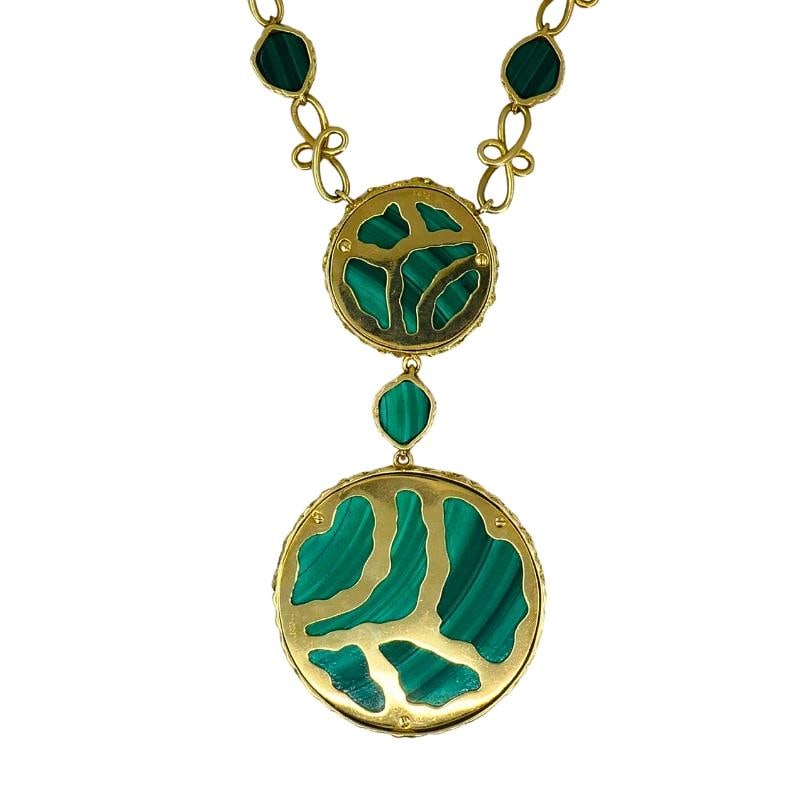 1980s Mauboussin Paris 18k Gold Malachite Pendant Necklace: Title: 1980s Mauboussin Paris 18k Gold Malachite Pendant Necklace Description: A dramatic Mauboussin 18k gold and malachite pendant necklace, circa 1980s. Designed in rich yellow gold, the necklace fe