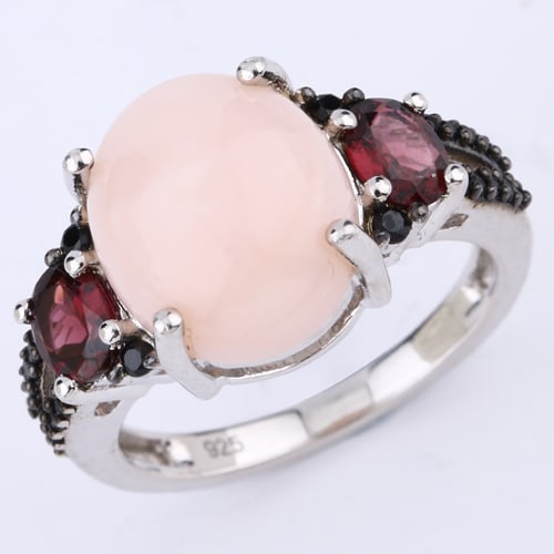 Ring: Pink Opal CAB Oval 12x10mm: Title: Ring: Pink Opal CAB Oval 12x10mm Description: Pink Opal CAB Oval 12x10mm - 1Pcs + Rhodolite Oval 5x4mm - 2Pcs + Black Spinel Round 1.50mm - 4Pcs + Black Spinel Round 1.00mm - 20Pcs Date/Period: